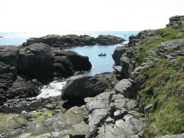 Rocky Outcrops inot the deep blue sea in trearddur bay